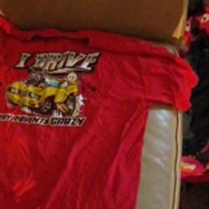 A red I drive my parents crazy tee shirt